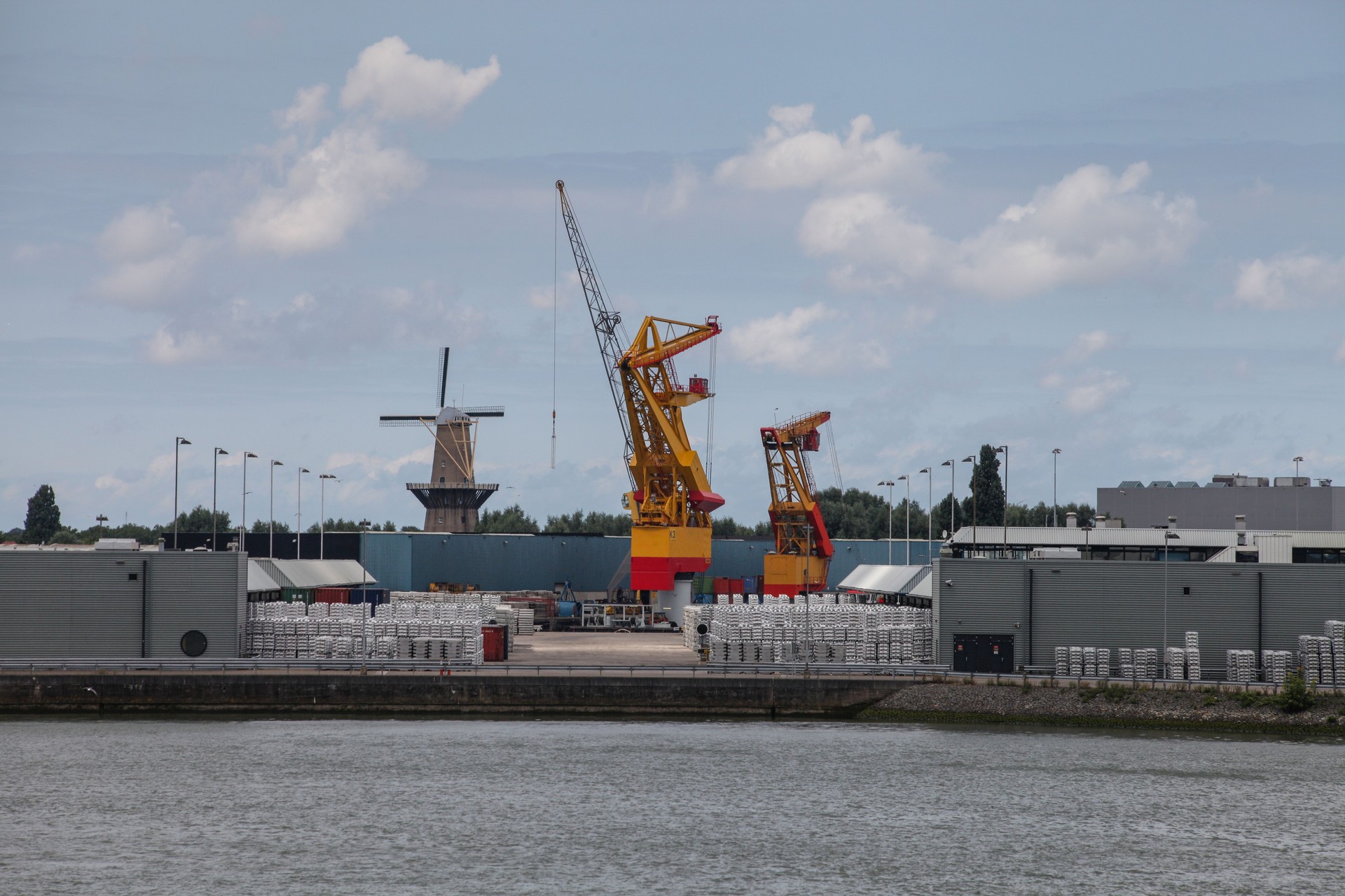 Cargo container ship at a container terminal in Rotterdam port, Netherlands